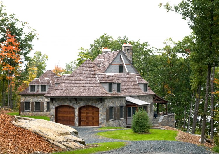 Private waterfront estate in Canaan, NH With rustic elegance with partially-exposed heavy timbers incorporated throughout